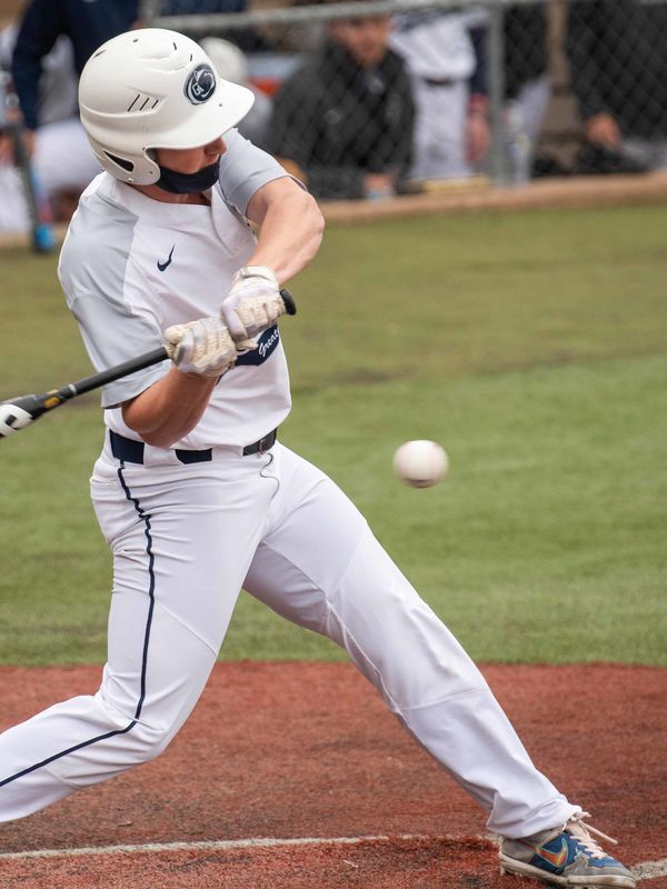 Penn State Greater Allegheny Baseball Player about to hit an incoming pitch.